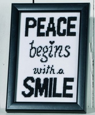 click here to view larger image of Peace Begins With A Smile (counted cross stitch kit)